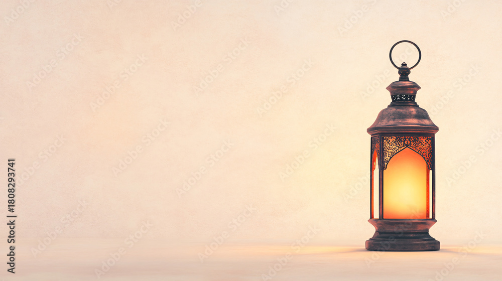 Obraz premium A vintage lantern with warm glow, showcasing intricate patterns in a serene, neutral-toned setting.