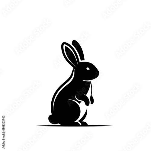 Black Silhouette of a Rabbit Standing Upright on a White Background.