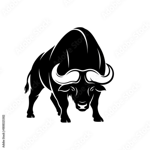 Powerful black bull stands ready to charge with impressive horns and strength.
