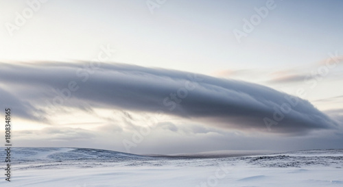 Explore winter landscape with snow covered ground and dramatic cloudscape for travel and nature photography 100