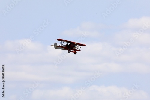 Bilde på lerret Biplane type aircraft on the sky