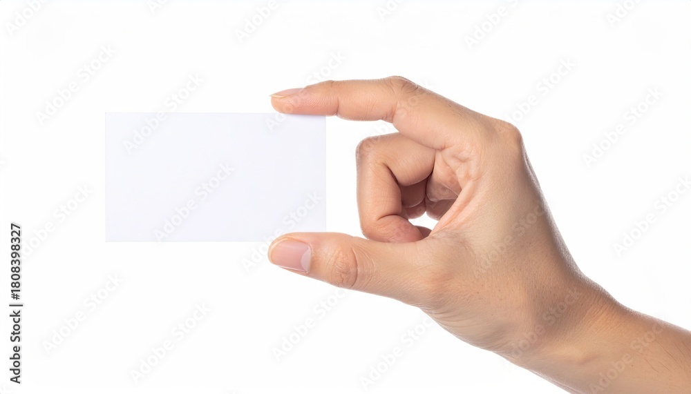 Obraz premium Hand Holding Blank White Card Isolated on White Background For Mockup Presentation Advertising Message Under Bright Studio Lighting