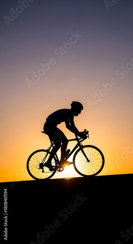 Wallpaper Mural Silhouette of a cyclist in motion against a warm sunset sky cycling bike Torontodigital.ca