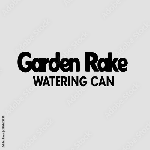Garden rake and watering can isolated on