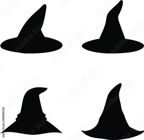 Four black silhouette witch hats isolated on a plain white background design