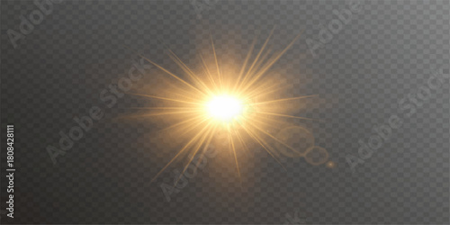 The bright sun with orange glow and rays shines in the blue sky