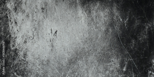 Dark grunge texture background with heavy diagonal scratches and distressed worn surface black and white vintage overlay.
