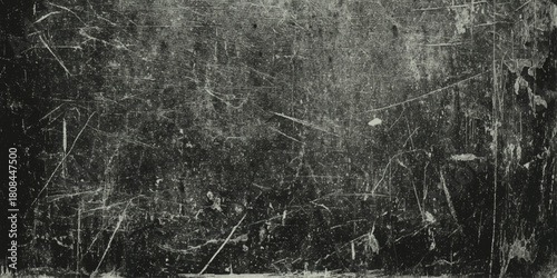 Dark grunge texture background with heavy diagonal scratches and distressed worn surface black and white vintage overlay.