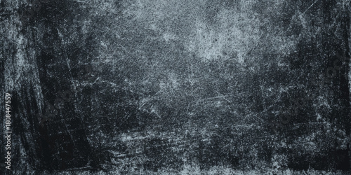 A monochrome high resolution texture featuring a heavily distressed and dark gray surface for wall and tails decor.