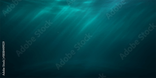 Deep ocean underwater loop of the sea with blue rays of light on a dark background in slow motion