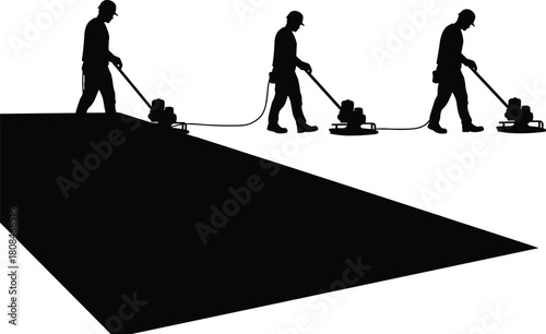 Construction workers smoothing concrete surface using power trowel machine, industrial floor finishing process for building site and construction project efficiency