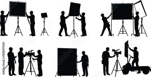 Film crew setting up lighting and camera equipment on set, teamwork in video production, professional cinematography and studio shooting preparation concept