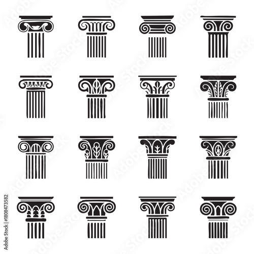 Collection of black ionic and Corinthian column capitals and shafts ancient