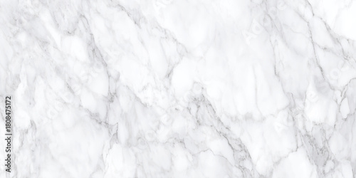 White marble flowing alcohol ink abstract background with darker vein like marble texture with a smooth marble surface.