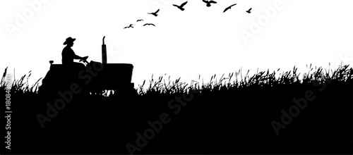Tractor on a field silhouette