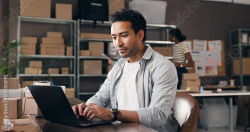 Tableau sur toile Logistics, man and typing on laptop in small business to track delivery, process order or shipping