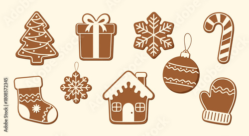 Collection of festive gingerbread cookies in various Christmas shapes on a light background.