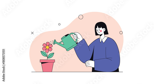 A person waters a pink flower in a pot with a green watering can.