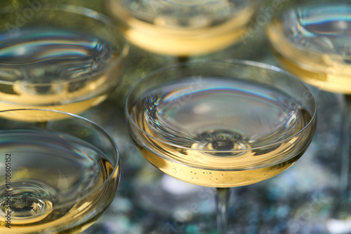 champagne wine in a coupe glasses ready to drink, close up.