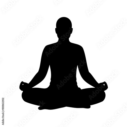 Silhouette of a person in lotus position meditating for wellness and health