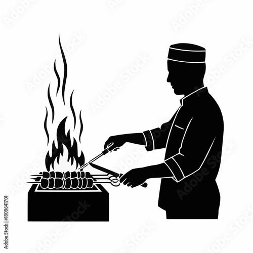 Silhouette of a Chef Grilling Skewers over an Open Flame.