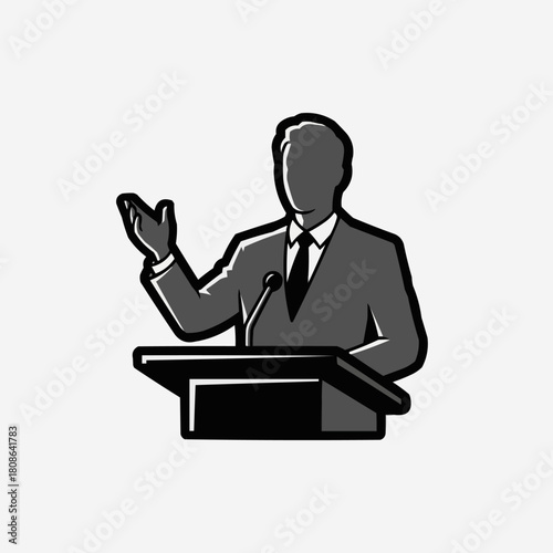 Silhouette of a speaker at a podium delivering a speech.