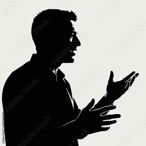 Silhouette of a man gesturing with hands while speaking passionately.