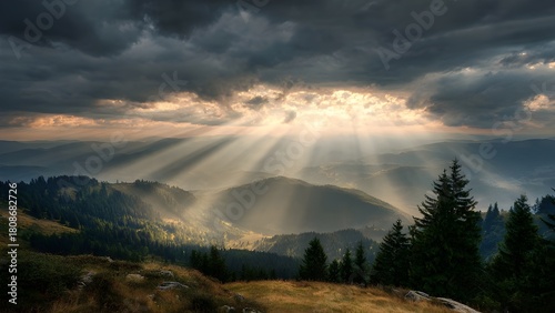 Beautiful serene mountain landscape, fluffy clouds, sun rays