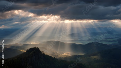 Beautiful serene mountain landscape, fluffy clouds, sun rays