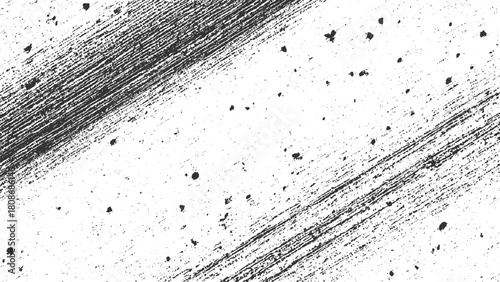 Black ink brush strokes and speckles on white background abstract