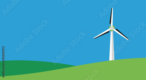Wind turbine on a green hill against a clear blue sky, showcasing renewable energy.