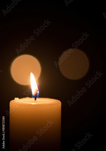 Wallpaper Mural Soft, warm candlelight lens flare creates a tranquil and peaceful ambiance in a darkened setting. The delicate glow adds a serene touch to any scene ,bright ,subtle ,serene Torontodigital.ca