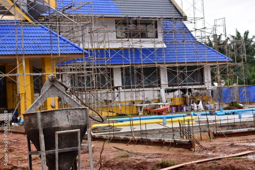 Scaffolding for building improvements, Renovation scaffolding enveloping historical building facade