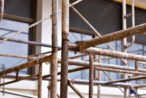 Scaffolding for building improvements, Renovation scaffolding enveloping historical building facade