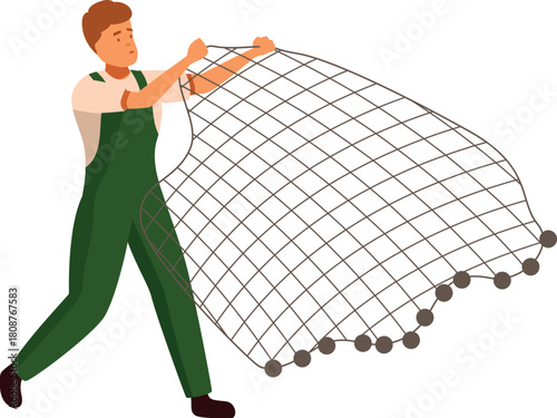 Fisherman wearing green dungarees, holding fishing net, pulling fish out of water