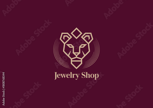 This sophisticated logo features a stylized lion head, representing luxury and strength, ideal for a high-end jewelry shop looking to make a strong impression.
