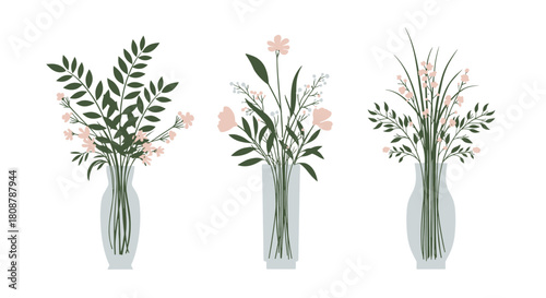 Three minimalist vases with delicate pink flowers and green foliage arranged on a white background.
