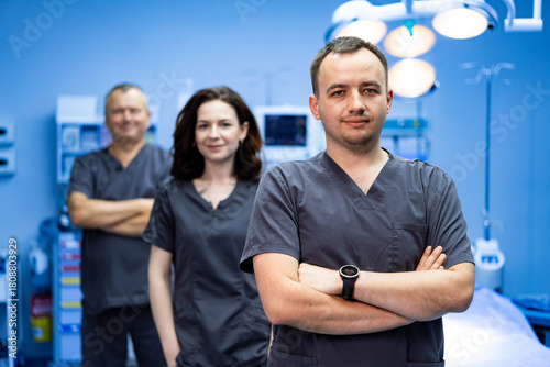 Medical team in surgery room. Doctors standing together in modern operating environment