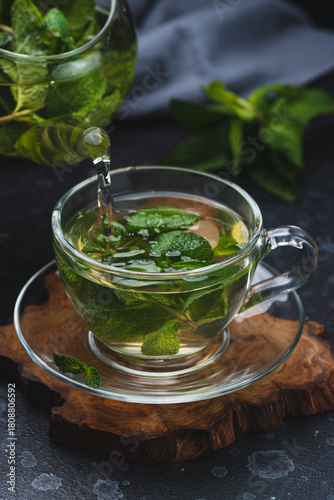Mint tea in a glass mug
