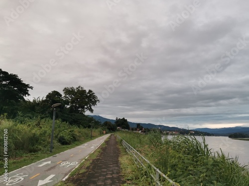 фотографія walkway along borderland on sky background