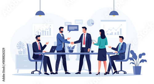 Business professionals shaking hands at a meeting, symbolizing partnership and a successful deal in a modern office environment.