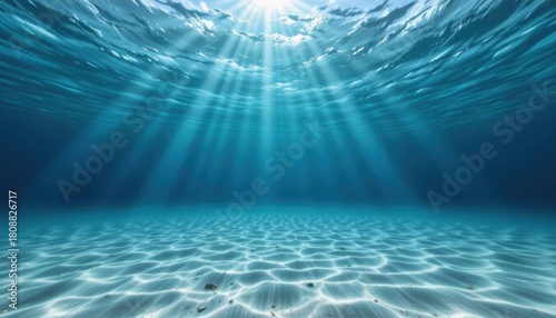 Radiant Sunlight Streaming Through Clear Ocean Water Creating Rippling Patterns on Sea Floor