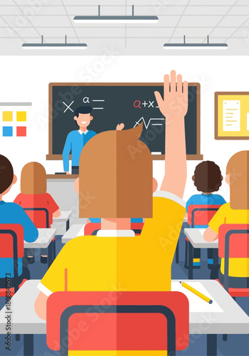 A student raises his hand to answer a question in a classroom with a teacher at the blackboard.