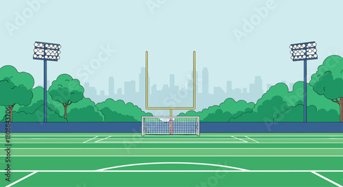 An empty sports stadium featuring both American football goalposts and a soccer goal, set against a backdrop of a modern city skyline and green trees on a clear day.