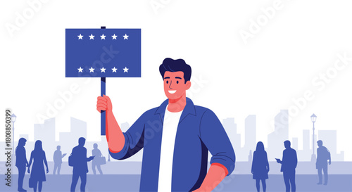 A young man confidently holds a blank sign in a public space, surrounded by blurred figures in a city setting, suggesting advocacy or protest.