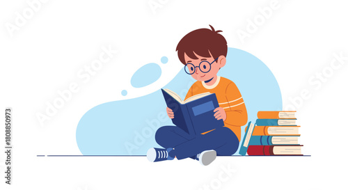 A young boy with glasses is engrossed in reading a book while sitting cross-legged near a stack of colorful books, fostering a love for learning.