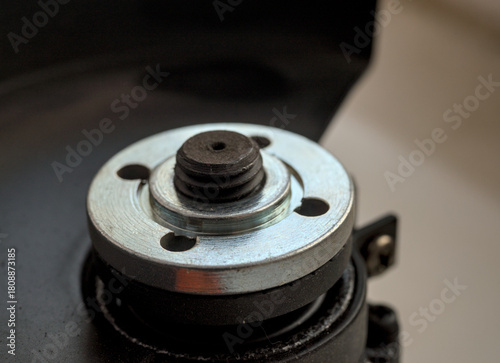 Fragment of angle grinder without abrasive disk.