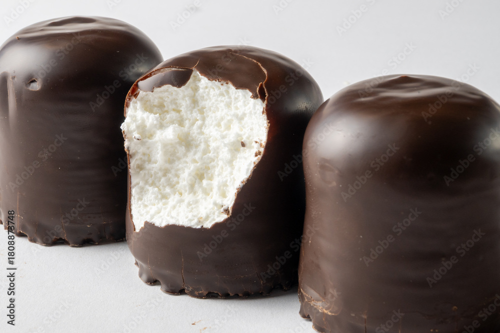 Obraz premium Chocolate Covered Marshmallows with Bite