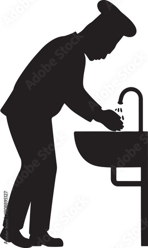 Chef washing hands at sink for hygiene in professional kitchen