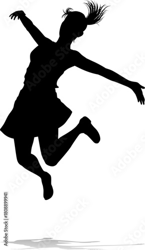 A happy woman jumping for j...